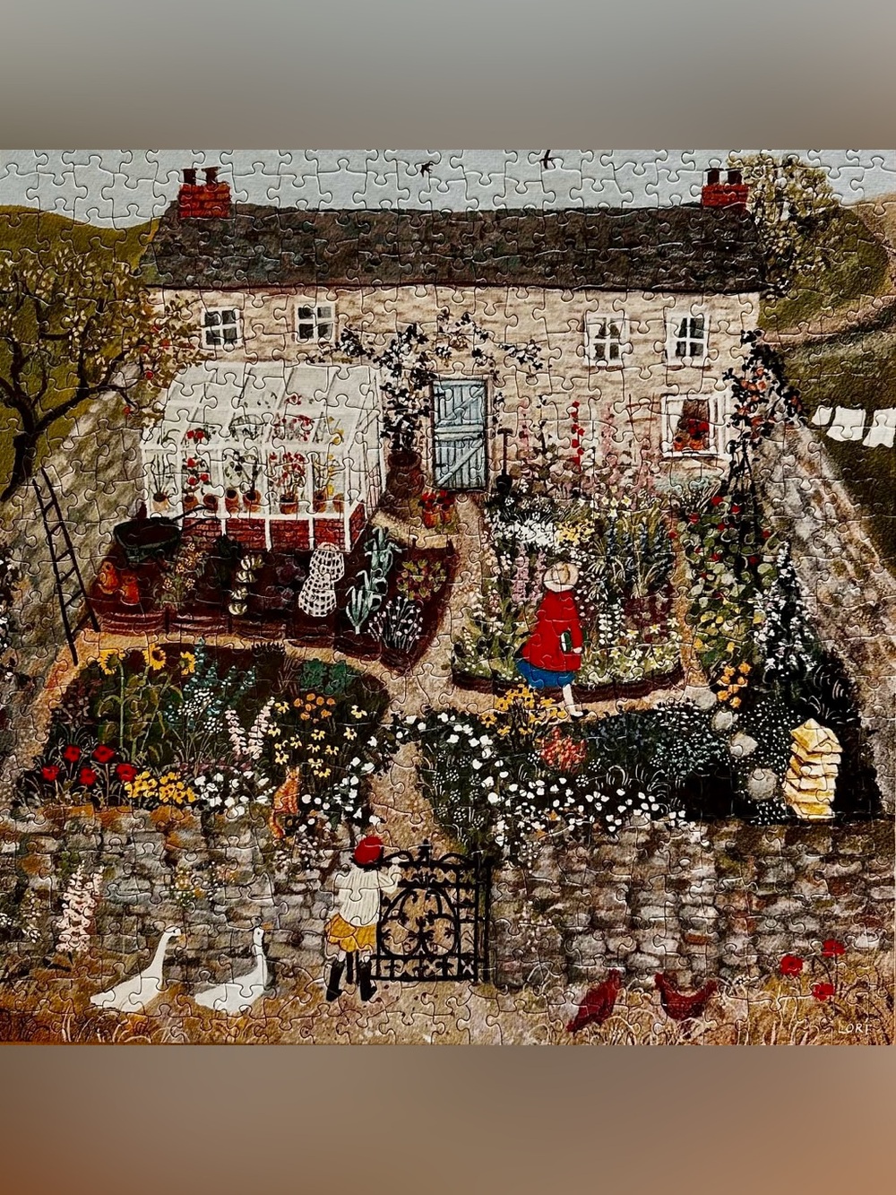Loré Pemberton “The Walled Garden” 500-Piece Puzzle - Picture 2 of 3